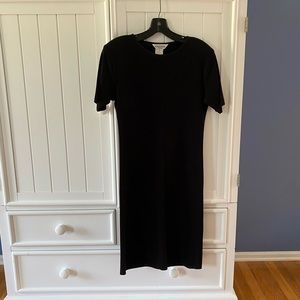 Short sleeve Black sheath dress.